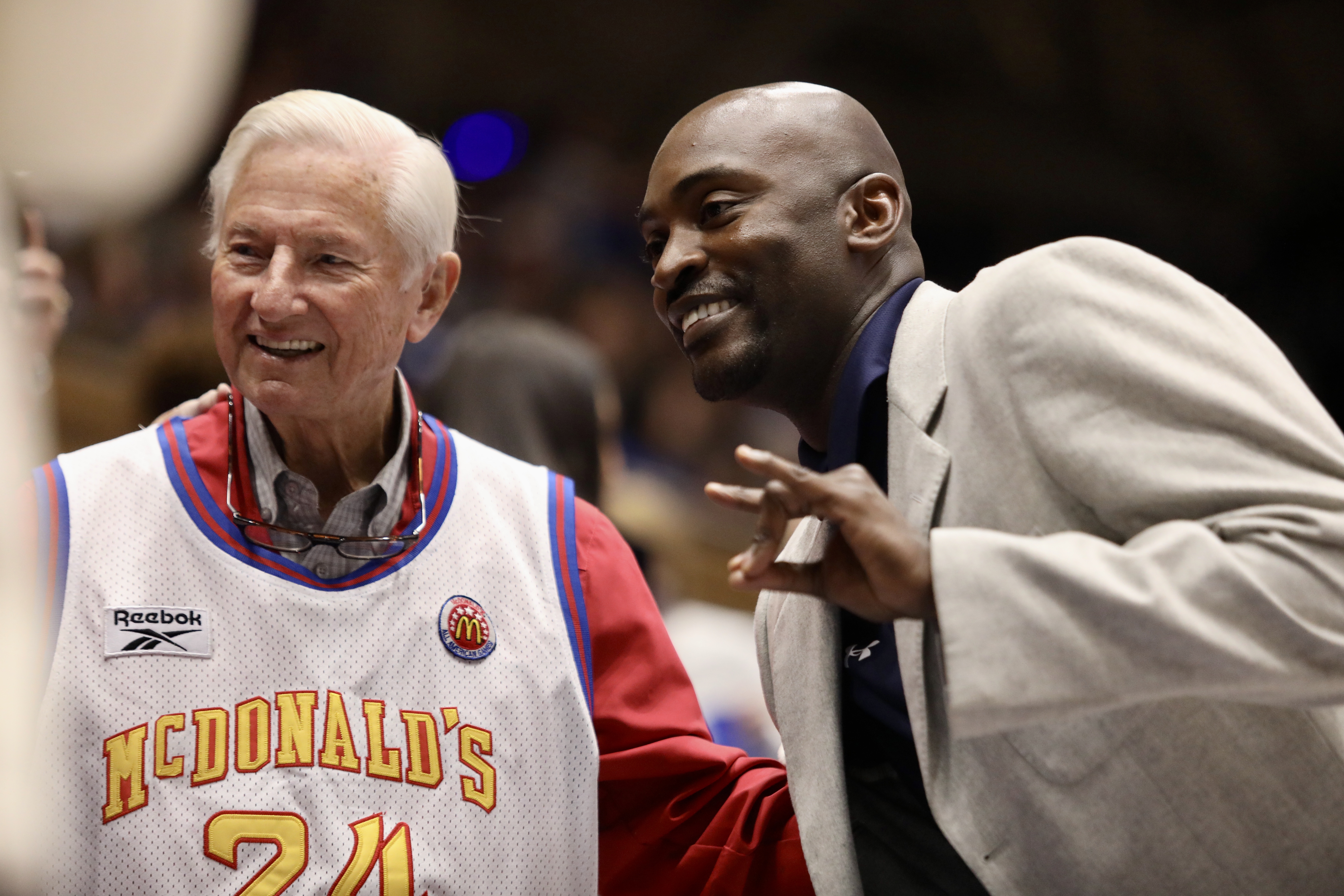 former nc state basketball player and now DII basketball head coach Julius Hodge with longtime NC state supporter